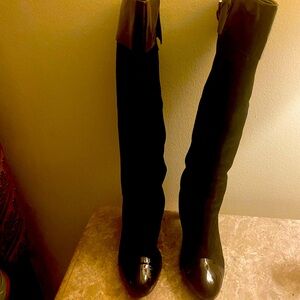 Gorgeous black suede and patent leather boots with heel.
